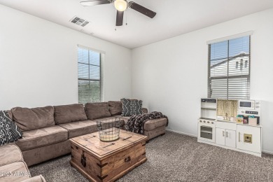 A beautifully crafted 4-bedroom, 2.5-bath Farmhouse-style home on Verrado Golf Club  in Arizona - for sale on GolfHomes.com, golf home, golf lot