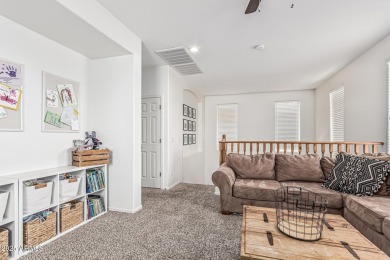 A beautifully crafted 4-bedroom, 2.5-bath Farmhouse-style home on Verrado Golf Club  in Arizona - for sale on GolfHomes.com, golf home, golf lot