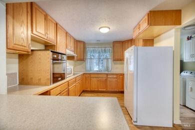 Cedar Cabin in the woods walking distance to Terrace Lakes Golf on Terrace Lakes Golf Resort in Idaho - for sale on GolfHomes.com, golf home, golf lot