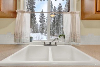 Cedar Cabin in the woods walking distance to Terrace Lakes Golf on Terrace Lakes Golf Resort in Idaho - for sale on GolfHomes.com, golf home, golf lot