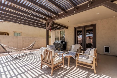 A beautifully crafted 4-bedroom, 2.5-bath Farmhouse-style home on Verrado Golf Club  in Arizona - for sale on GolfHomes.com, golf home, golf lot