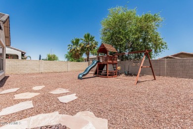 A beautifully crafted 4-bedroom, 2.5-bath Farmhouse-style home on Verrado Golf Club  in Arizona - for sale on GolfHomes.com, golf home, golf lot
