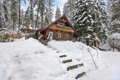 Cedar Cabin in the woods walking distance to Terrace Lakes Golf on Terrace Lakes Golf Resort in Idaho - for sale on GolfHomes.com, golf home, golf lot