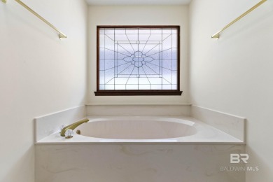 Welcome to this 3-bedroom, 2.5-bath Creole-style home located in on The Golf Club of the Wharf in Alabama - for sale on GolfHomes.com, golf home, golf lot