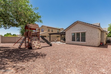 A beautifully crafted 4-bedroom, 2.5-bath Farmhouse-style home on Verrado Golf Club  in Arizona - for sale on GolfHomes.com, golf home, golf lot