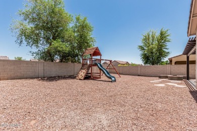 A beautifully crafted 4-bedroom, 2.5-bath Farmhouse-style home on Verrado Golf Club  in Arizona - for sale on GolfHomes.com, golf home, golf lot