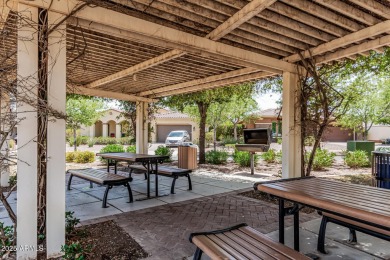 A beautifully crafted 4-bedroom, 2.5-bath Farmhouse-style home on Verrado Golf Club  in Arizona - for sale on GolfHomes.com, golf home, golf lot