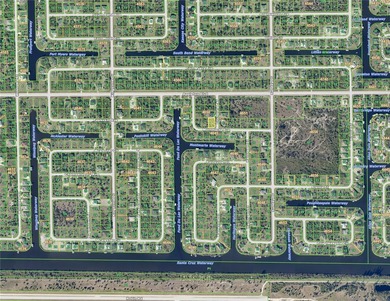 Across from the water located in the very special community of on Rotonda Golf and Country Club - Long Marsh  in Florida - for sale on GolfHomes.com, golf home, golf lot