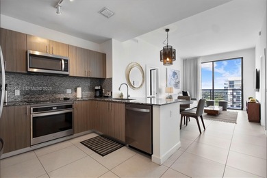 Experience penthouse living with golf course views from this on Doral Golf Resort in Florida - for sale on GolfHomes.com, golf home, golf lot