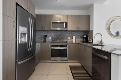 Experience penthouse living with golf course views from this on Doral Golf Resort in Florida - for sale on GolfHomes.com, golf home, golf lot