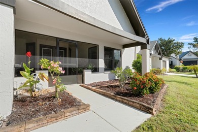 BRAND NEW ROOF in 2025 and located in Palm Harbor's premier 55+ on Highland Lakes Executive Golf Course in Florida - for sale on GolfHomes.com, golf home, golf lot