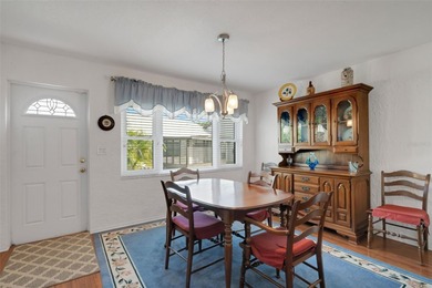 BRAND NEW ROOF in 2025 and located in Palm Harbor's premier 55+ on Highland Lakes Executive Golf Course in Florida - for sale on GolfHomes.com, golf home, golf lot