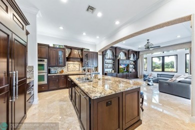 Magnificent custom home in PGCC. This mini mansion offers 6 on Parkland Golf Club in Florida - for sale on GolfHomes.com, golf home, golf lot