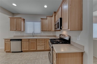 Nestled in the gated 55+ community of Solera at Stallion on Stallion Mountain Golf Course in Nevada - for sale on GolfHomes.com, golf home, golf lot