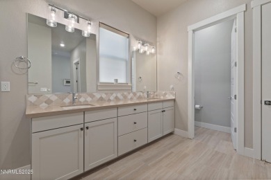 Welcome to your dream home! This beautifully crafted Brae home on Somersett Country Club in Nevada - for sale on GolfHomes.com, golf home, golf lot