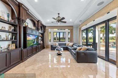 Magnificent custom home in PGCC. This mini mansion offers 6 on Parkland Golf Club in Florida - for sale on GolfHomes.com, golf home, golf lot