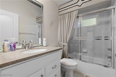 This exquisite 4-bedroom + den, 3-bathroom Pool Home sits on the on Gateway Golf and Country Club in Florida - for sale on GolfHomes.com, golf home, golf lot