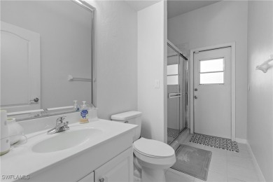 This exquisite 4-bedroom + den, 3-bathroom Pool Home sits on the on Gateway Golf and Country Club in Florida - for sale on GolfHomes.com, golf home, golf lot