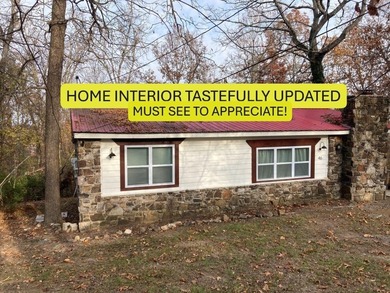 All new UPDATED INTERIOR in this 2-bedroom, 2 bath home with on Cherokee Village North Course in Arkansas - for sale on GolfHomes.com, golf home, golf lot