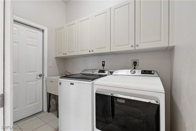 This exquisite 4-bedroom + den, 3-bathroom Pool Home sits on the on Gateway Golf and Country Club in Florida - for sale on GolfHomes.com, golf home, golf lot