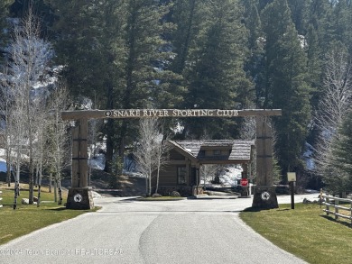 Indulge in the ultimate mountain retreat with this fully on Snake River Sporting Club in Wyoming - for sale on GolfHomes.com, golf home, golf lot