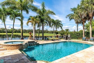 Magnificent custom home in PGCC. This mini mansion offers 6 on Parkland Golf Club in Florida - for sale on GolfHomes.com, golf home, golf lot