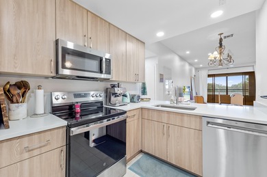 Resort style living in this third floor unit with expansive on Boca Pointe Country Club in Florida - for sale on GolfHomes.com, golf home, golf lot