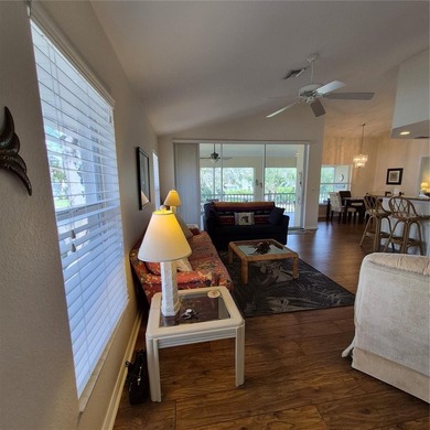 Discover refined Florida living in this beautifully appointed on Riverwood Golf Club in Florida - for sale on GolfHomes.com, golf home, golf lot