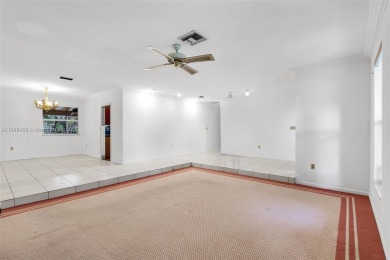 Welcome to the upscale golf-course community of Loch Lomond, one on Don Shulas Golf Course and Club in Florida - for sale on GolfHomes.com, golf home, golf lot