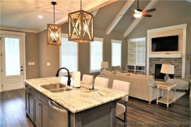 This picturesque home in the gated section of Kings Grant golf on Kings Grant Golf and Country Club in North Carolina - for sale on GolfHomes.com, golf home, golf lot