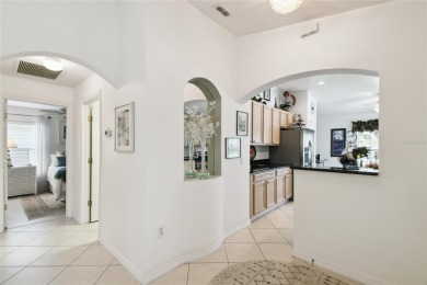 LOVELY 2 Bedroom, 2 Bath plus den BORDEAUX Model with CANAL and on Poinciana Golf Club in Florida - for sale on GolfHomes.com, golf home, golf lot