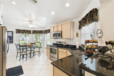 LOVELY 2 Bedroom, 2 Bath plus den BORDEAUX Model with CANAL and on Poinciana Golf Club in Florida - for sale on GolfHomes.com, golf home, golf lot