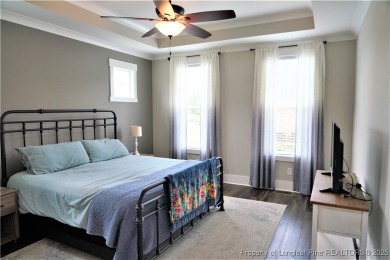 This picturesque home in the gated section of Kings Grant golf on Kings Grant Golf and Country Club in North Carolina - for sale on GolfHomes.com, golf home, golf lot