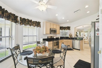 LOVELY 2 Bedroom, 2 Bath plus den BORDEAUX Model with CANAL and on Poinciana Golf Club in Florida - for sale on GolfHomes.com, golf home, golf lot