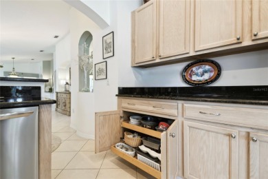 LOVELY 2 Bedroom, 2 Bath plus den BORDEAUX Model with CANAL and on Poinciana Golf Club in Florida - for sale on GolfHomes.com, golf home, golf lot
