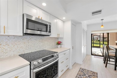 Welcome to effortless Florida living in this UPDATED, MOVE-IN on Deer Creek Golf Club in Florida - for sale on GolfHomes.com, golf home, golf lot