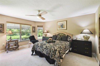 LOVELY 2 Bedroom, 2 Bath plus den BORDEAUX Model with CANAL and on Poinciana Golf Club in Florida - for sale on GolfHomes.com, golf home, golf lot