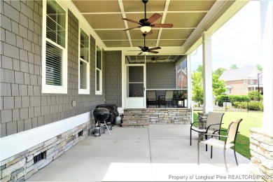 This picturesque home in the gated section of Kings Grant golf on Kings Grant Golf and Country Club in North Carolina - for sale on GolfHomes.com, golf home, golf lot
