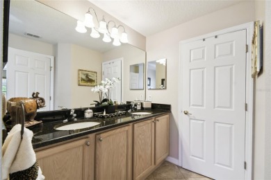 LOVELY 2 Bedroom, 2 Bath plus den BORDEAUX Model with CANAL and on Poinciana Golf Club in Florida - for sale on GolfHomes.com, golf home, golf lot