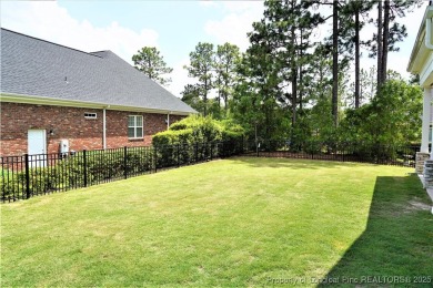 This picturesque home in the gated section of Kings Grant golf on Kings Grant Golf and Country Club in North Carolina - for sale on GolfHomes.com, golf home, golf lot