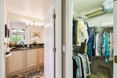 LOVELY 2 Bedroom, 2 Bath plus den BORDEAUX Model with CANAL and on Poinciana Golf Club in Florida - for sale on GolfHomes.com, golf home, golf lot