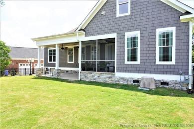 This picturesque home in the gated section of Kings Grant golf on Kings Grant Golf and Country Club in North Carolina - for sale on GolfHomes.com, golf home, golf lot