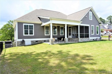 This picturesque home in the gated section of Kings Grant golf on Kings Grant Golf and Country Club in North Carolina - for sale on GolfHomes.com, golf home, golf lot