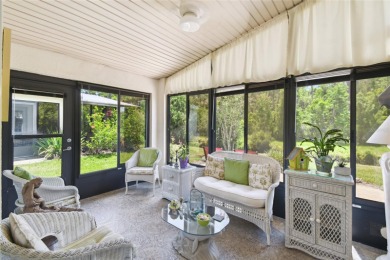 LOVELY 2 Bedroom, 2 Bath plus den BORDEAUX Model with CANAL and on Poinciana Golf Club in Florida - for sale on GolfHomes.com, golf home, golf lot