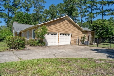 Beautiful 3-bedroom, 2.5-bath ranch style home located in the on Cypress Lakes Golf Course in North Carolina - for sale on GolfHomes.com, golf home, golf lot