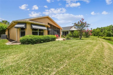 LOVELY 2 Bedroom, 2 Bath plus den BORDEAUX Model with CANAL and on Poinciana Golf Club in Florida - for sale on GolfHomes.com, golf home, golf lot