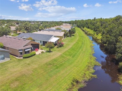 LOVELY 2 Bedroom, 2 Bath plus den BORDEAUX Model with CANAL and on Poinciana Golf Club in Florida - for sale on GolfHomes.com, golf home, golf lot
