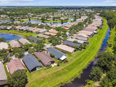 LOVELY 2 Bedroom, 2 Bath plus den BORDEAUX Model with CANAL and on Poinciana Golf Club in Florida - for sale on GolfHomes.com, golf home, golf lot