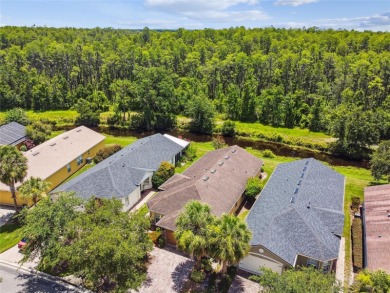 LOVELY 2 Bedroom, 2 Bath plus den BORDEAUX Model with CANAL and on Poinciana Golf Club in Florida - for sale on GolfHomes.com, golf home, golf lot