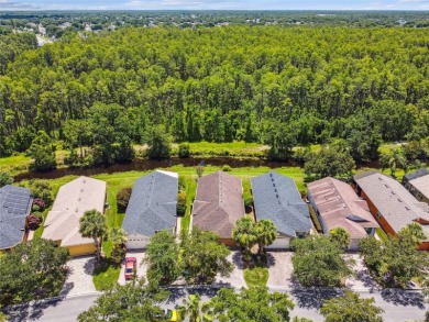 LOVELY 2 Bedroom, 2 Bath plus den BORDEAUX Model with CANAL and on Poinciana Golf Club in Florida - for sale on GolfHomes.com, golf home, golf lot